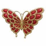 OKRASEK ZA JELKO GLOSSTYLE METULJ NA ŠČIPALKI RDEČ ZLAT 11.68*2.54*9.65 CM