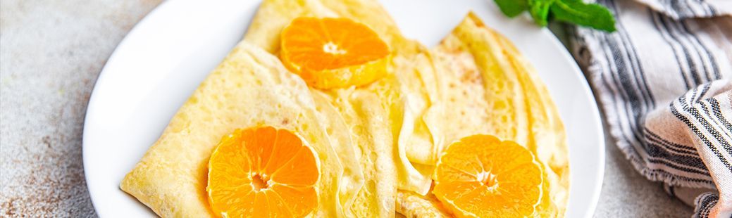 Palačinke s pomarančno-limonino omako